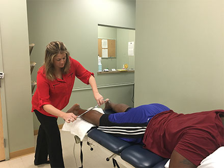 Patient receiving Graston therapy