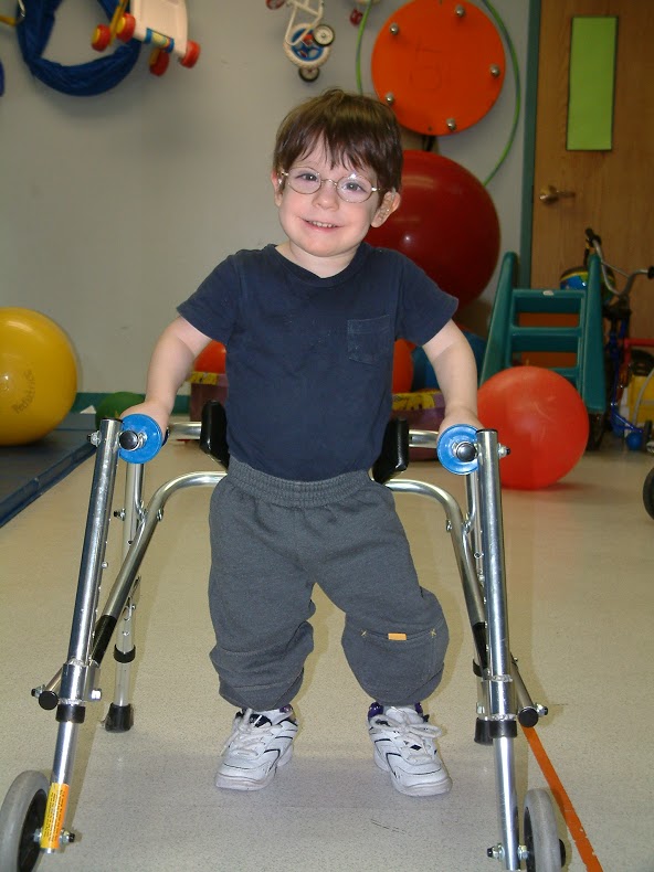 Child walking with special equipment