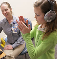 Child working with interactive metronome