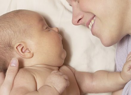 Mother and Baby smiling at eachother