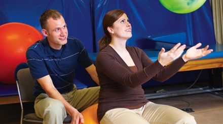 Patient tossing ball for therapy