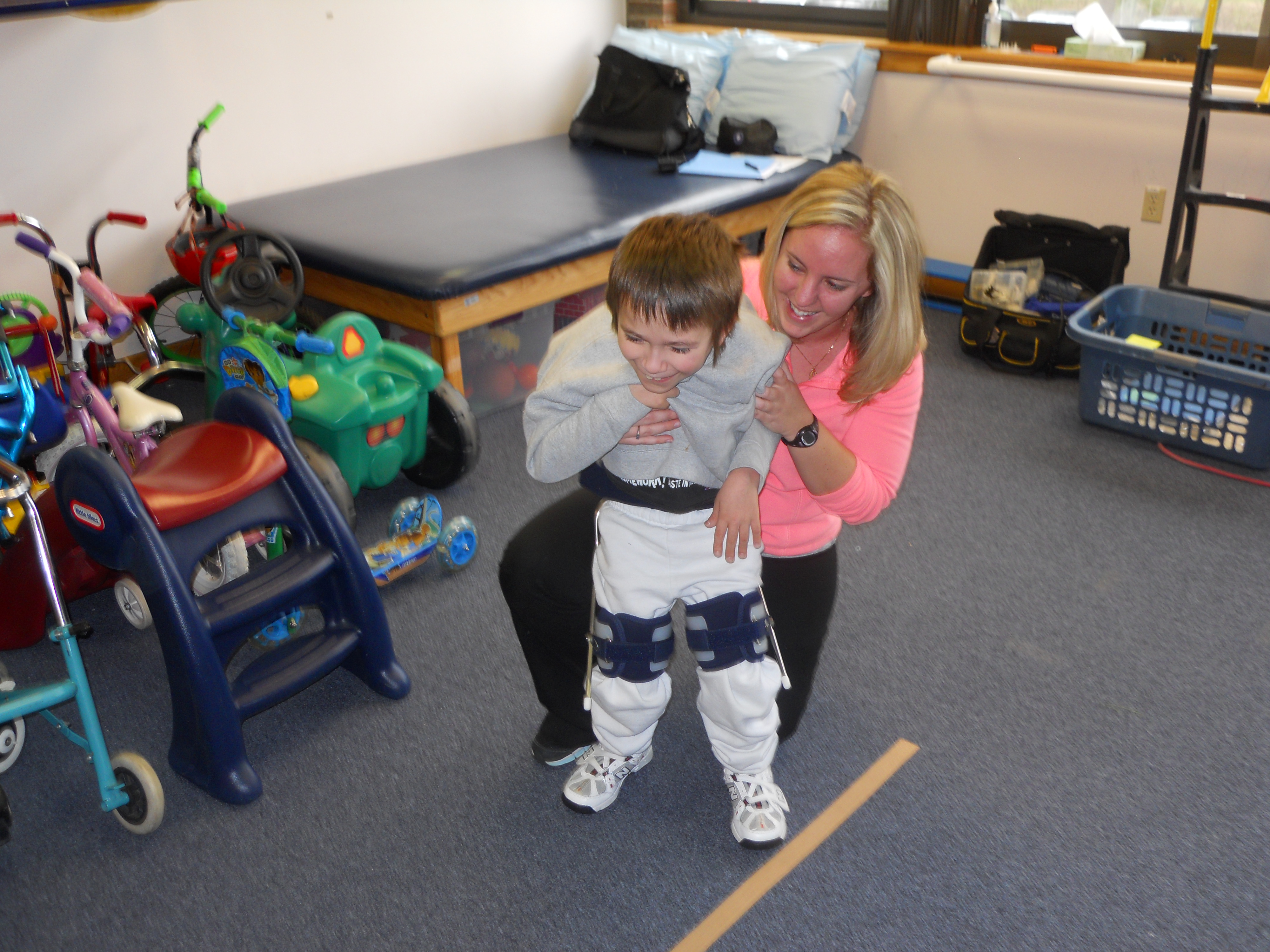 Child walking with orthotics