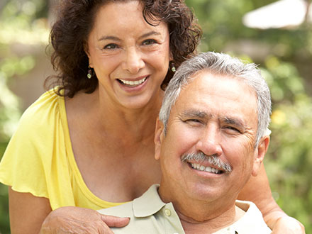 Couple relaxing in garden