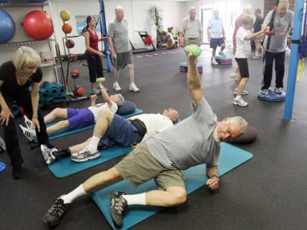 Patient on mats excercising