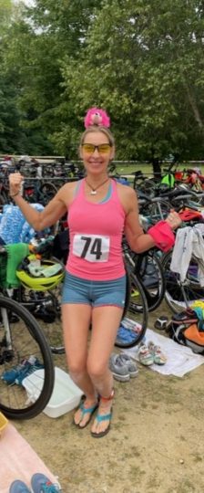 Photo of Lynne at a triathlon where she recently placed 2nd in her age group.